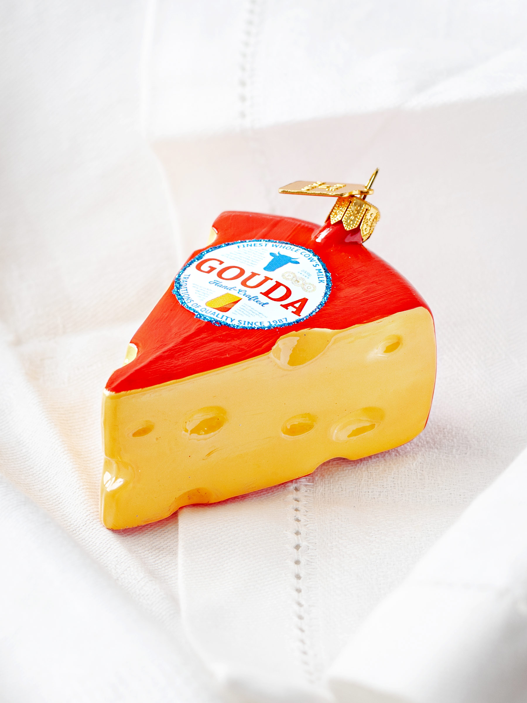 Елочная игрушка «Сыр Gouda» Стекло. 80 x 60 мм.