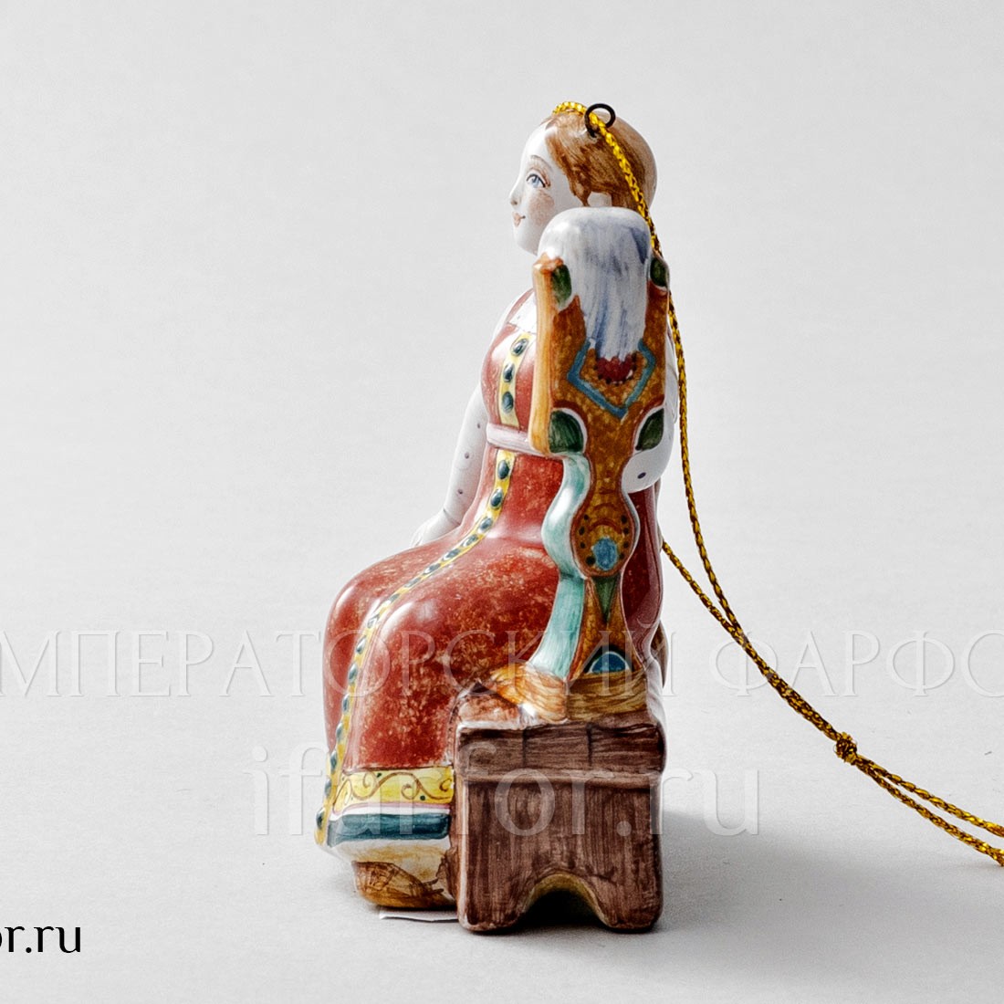 Елочная игрушка «Пряха» Форма: Пряха. Майолика. 65 x 90 мм.