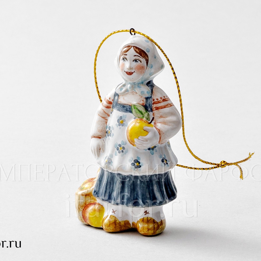 Елочная игрушка «Девочка с яблоками» Форма: Девочка с яблоками. Майолика. 50 x 80 мм.