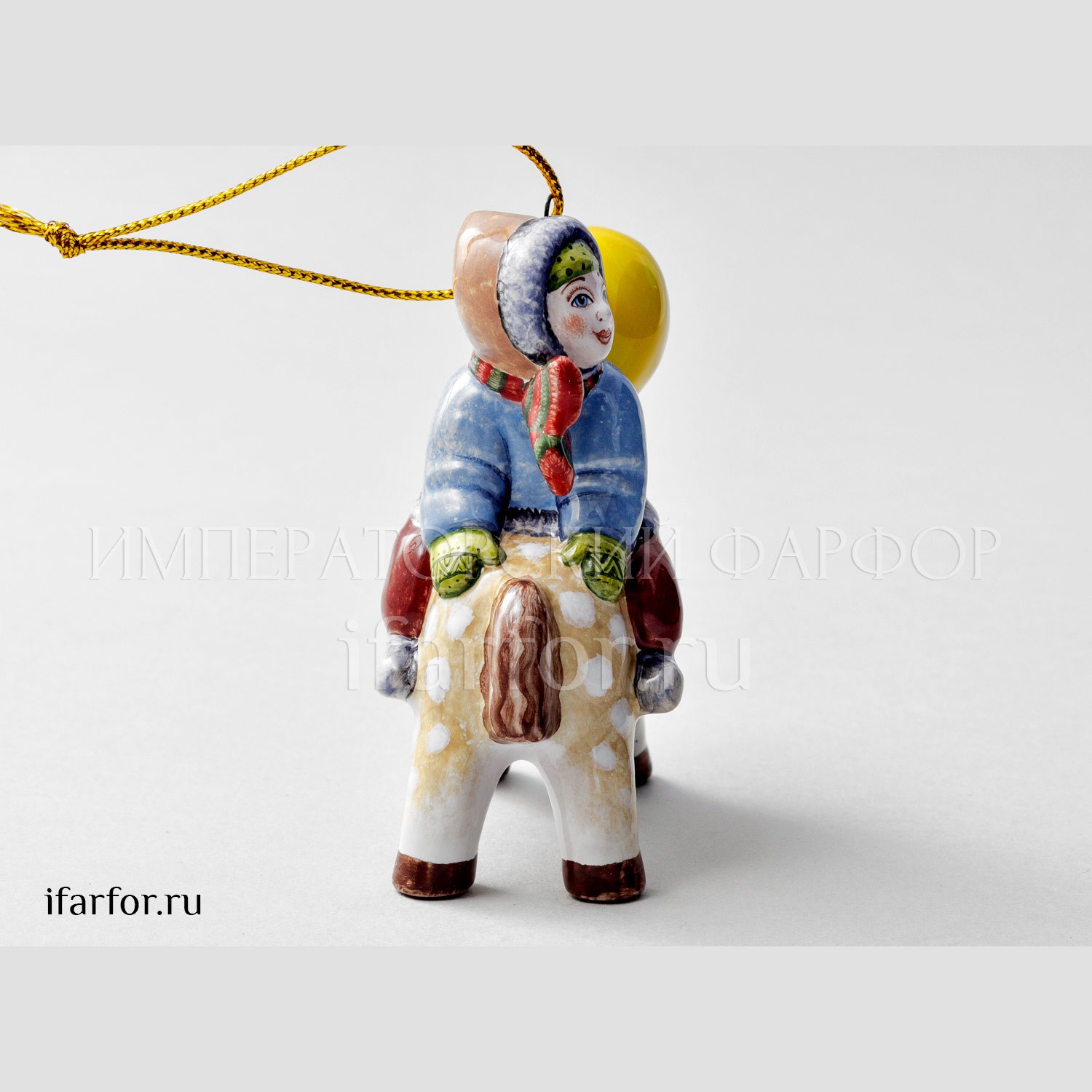 Елочная игрушка «Мальчик с шариком на лошадке» Форма: Мальчик с шариком на лошадке. Майолика. 80 x 90 мм.