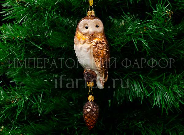 Christmas tree toy Owl with a pine cone