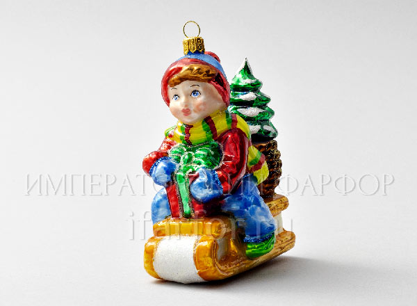 Christmas tree toy Boy on a sled in blue pants