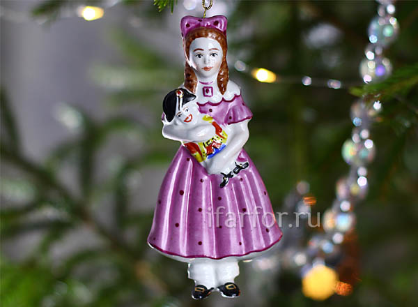 Christmas tree toy Girl with a Nutcracker The girl with a nutcracker is salient