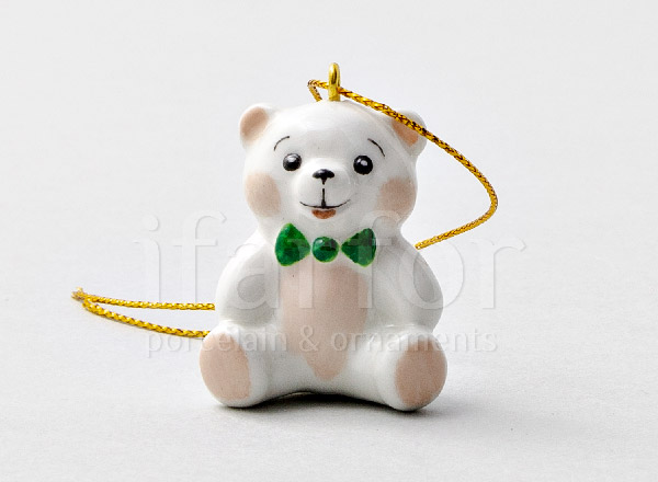 Christmas tree toy Teddy bear with a green bow