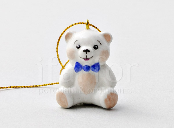Christmas tree toy Teddy bear with a blue bow
