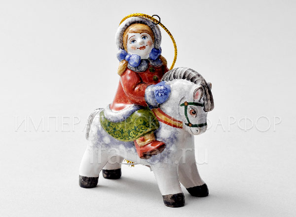 Christmas tree toy Girl with bows on a horse