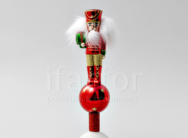 Christmas tree toy in a gift box Christmas tree top Nutcracker with fluffy hair