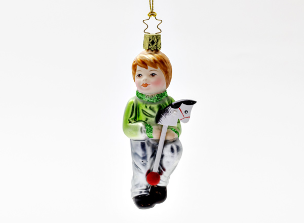 Christmas tree toy Innocent hearts. Boy on a jump rope