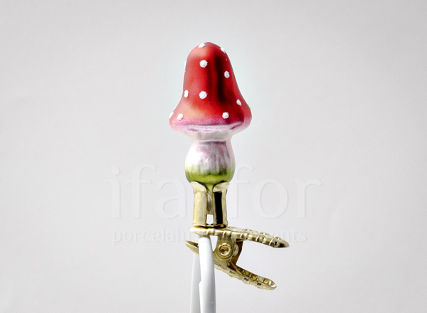 Christmas tree toy MMushrooms. Mushroom with a high head