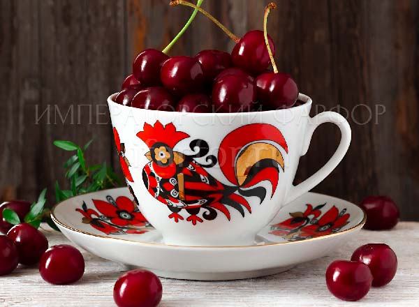 Cup and saucer tea Red cockerels Spring