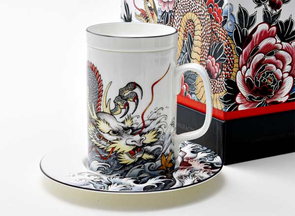 Mug with a lid and saucer in a gift box Tattoo. Dragon 