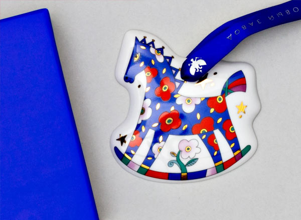 Christmas tree toy in a gift box Little horse Blue